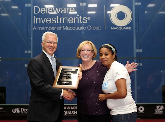 Presenting the PSRA Service Award to Molly Pierce (middle) was PSRA president, Nick Lepore (L) and SquashSmarts Alum and current coach, representing Coach Across America, Sakora Miller (R). Pierce