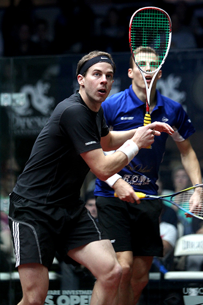 Grayson (L) against finalist Nick Matthew in the 2013 round of sixteen. (image: Steve Line/squashpics.com)