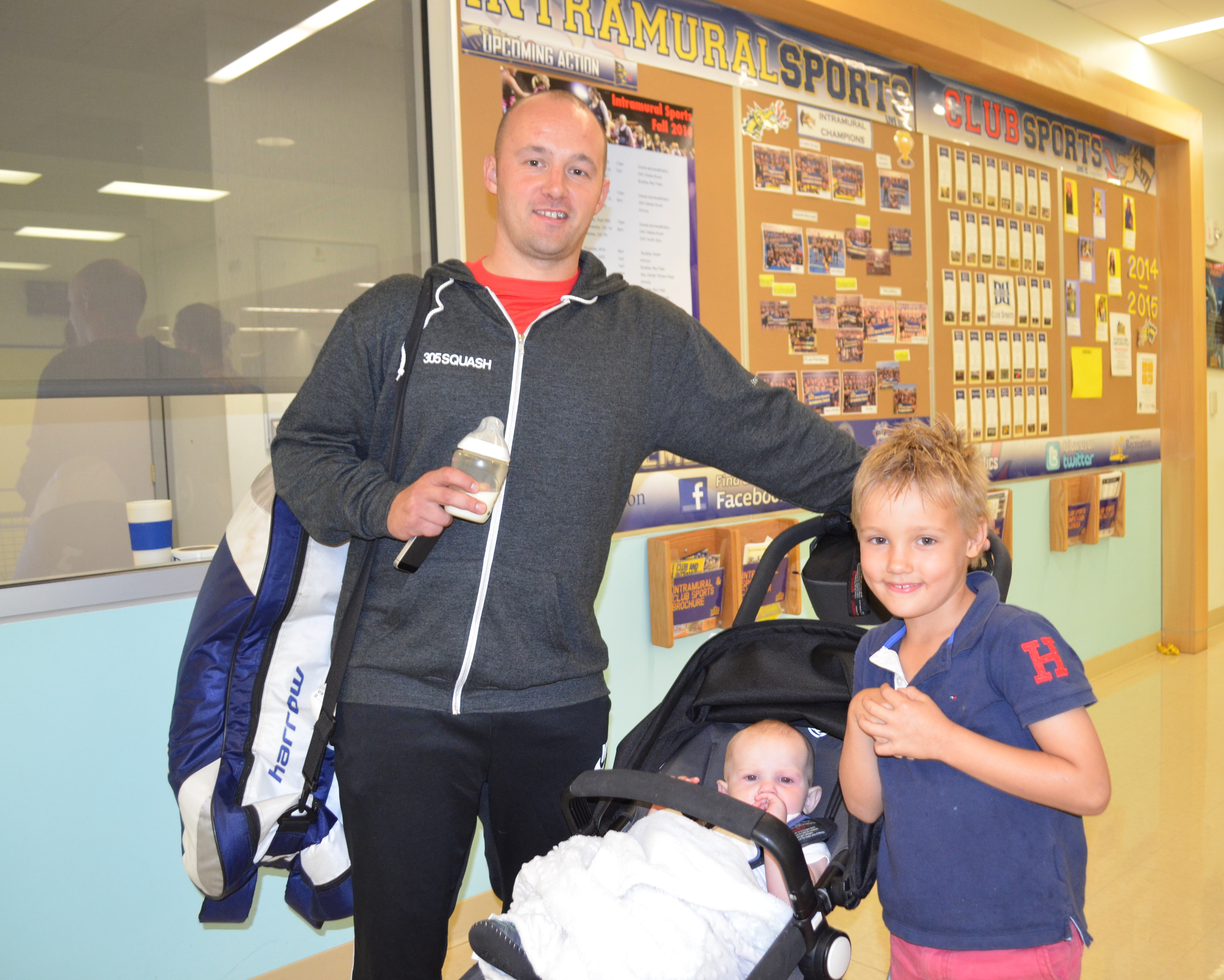 Alex Stait (L) with sons Jamie (R), seven years old, and Cameron, one years old.