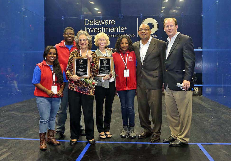 Nancy Peter (middle left) and Wendy Palmer (middle right) with award-presenters from SquashSmarts (Image: Steve Line)
